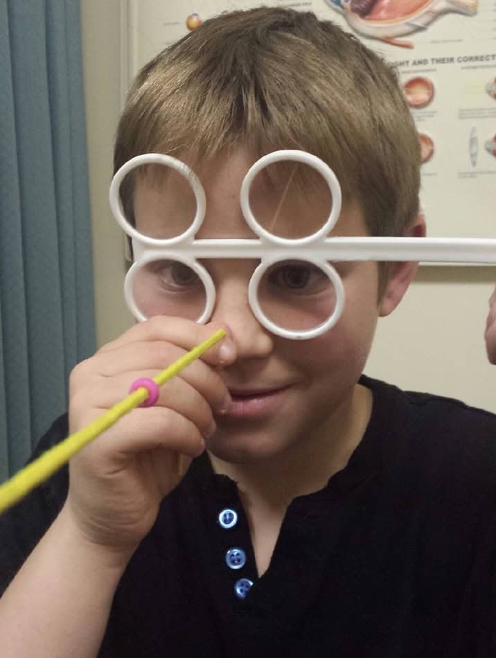 Brock getting an eye test at Eye Care for Kids