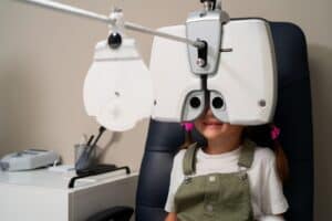 Child getting a behavioural optometry eye test in melbourne